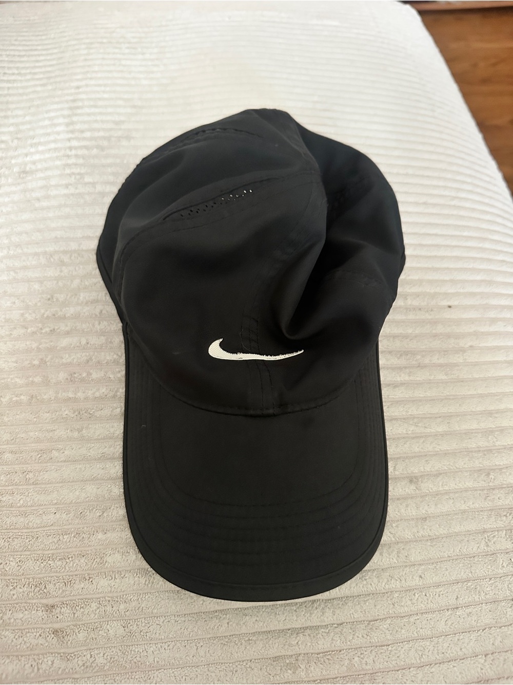 Nike Dri-Fit Featherlight Black 6 Panel Hat with White Swoosh Logo